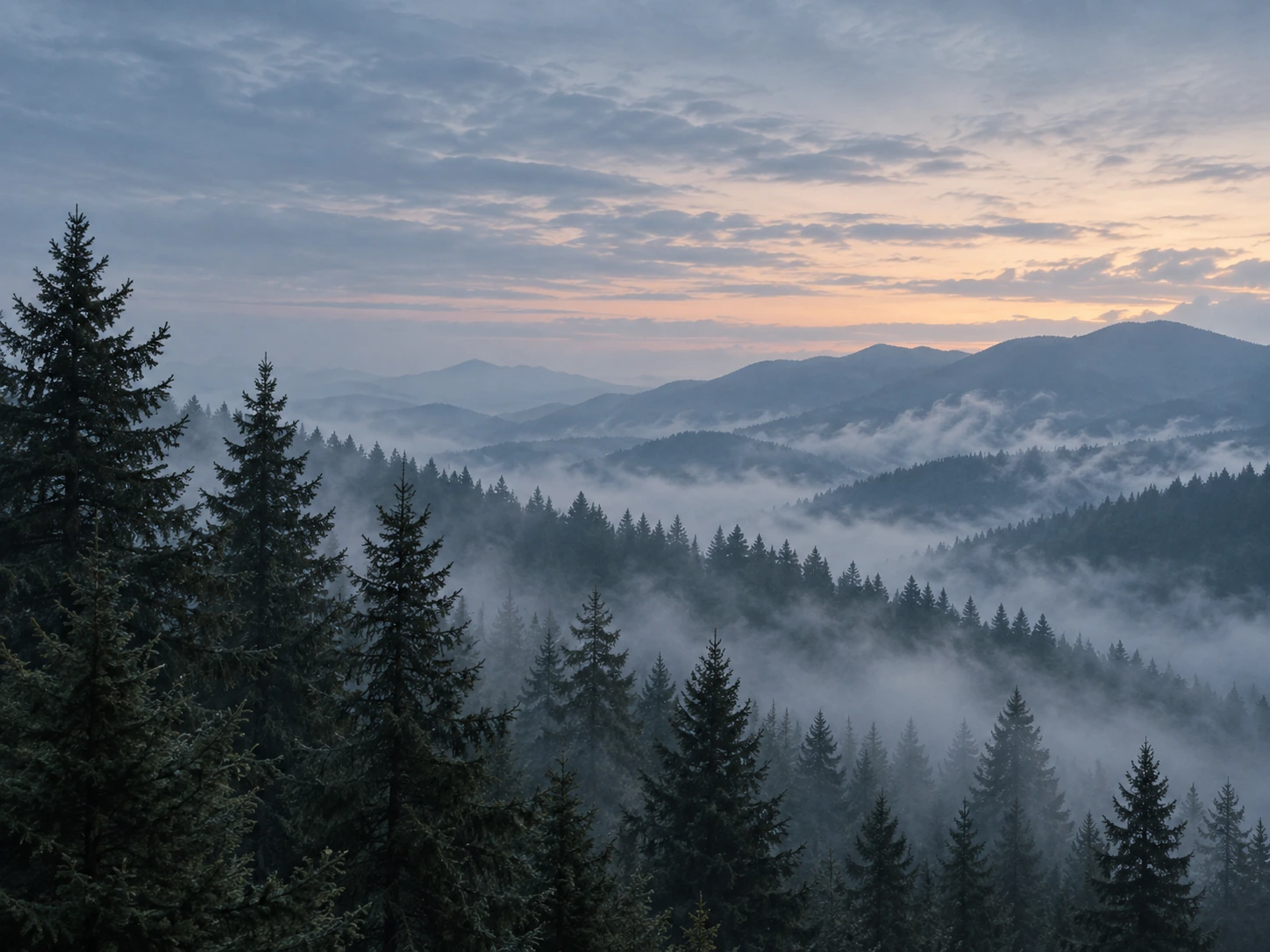 Layered mountain ridges fading into the distance. Detail image beside feature or story text.