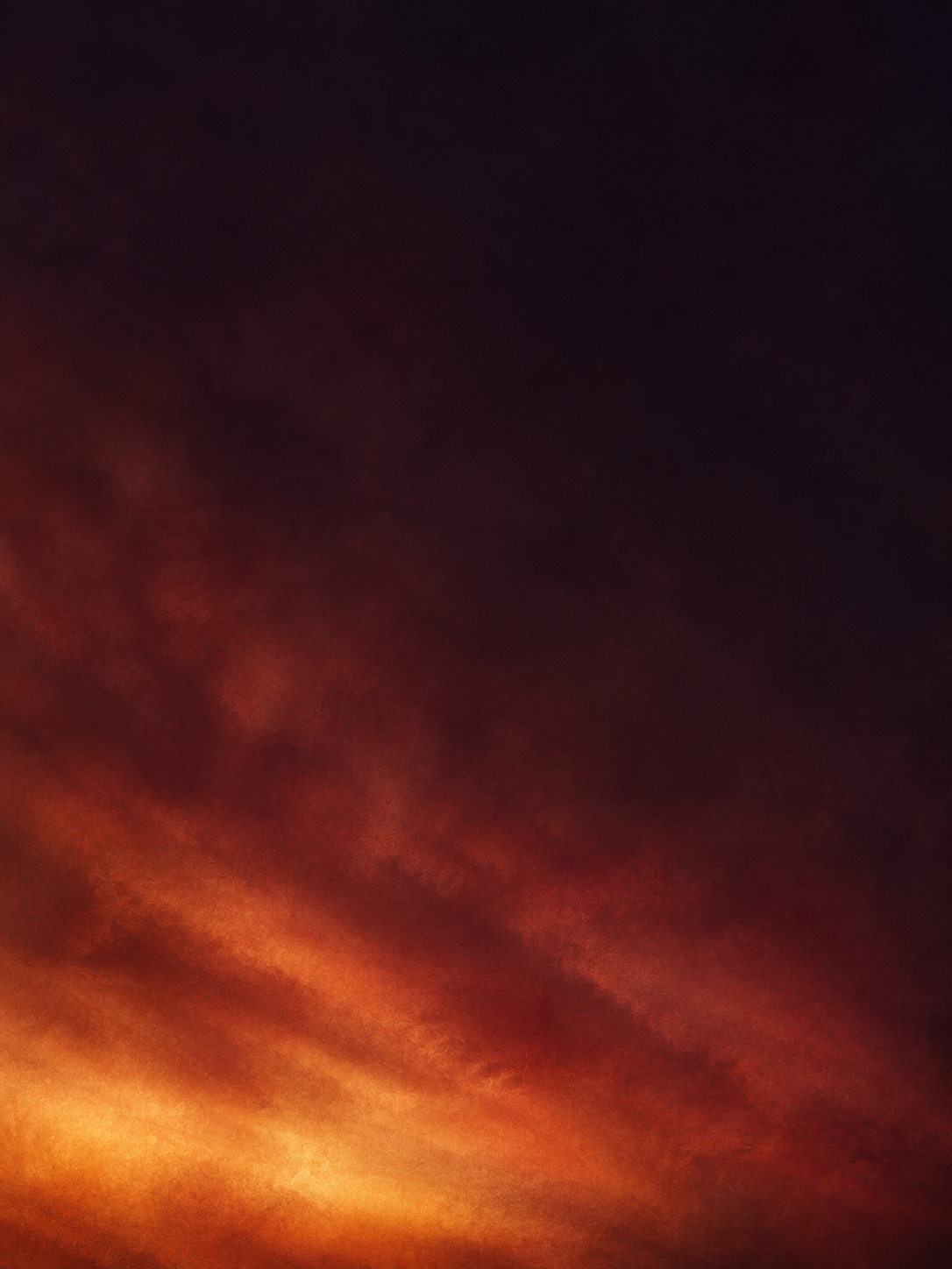 A soft afterglow in deep burgundy tones. Mobile hero or tall editorial panel.