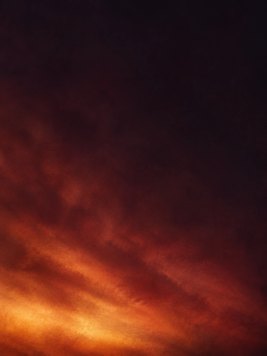 A soft afterglow in deep burgundy tones. Mobile hero or tall editorial panel.