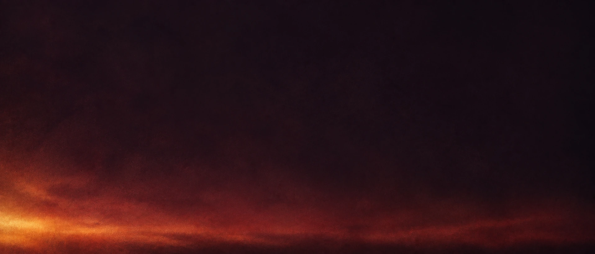 A soft afterglow in deep burgundy tones. Low-detail section background or divider.