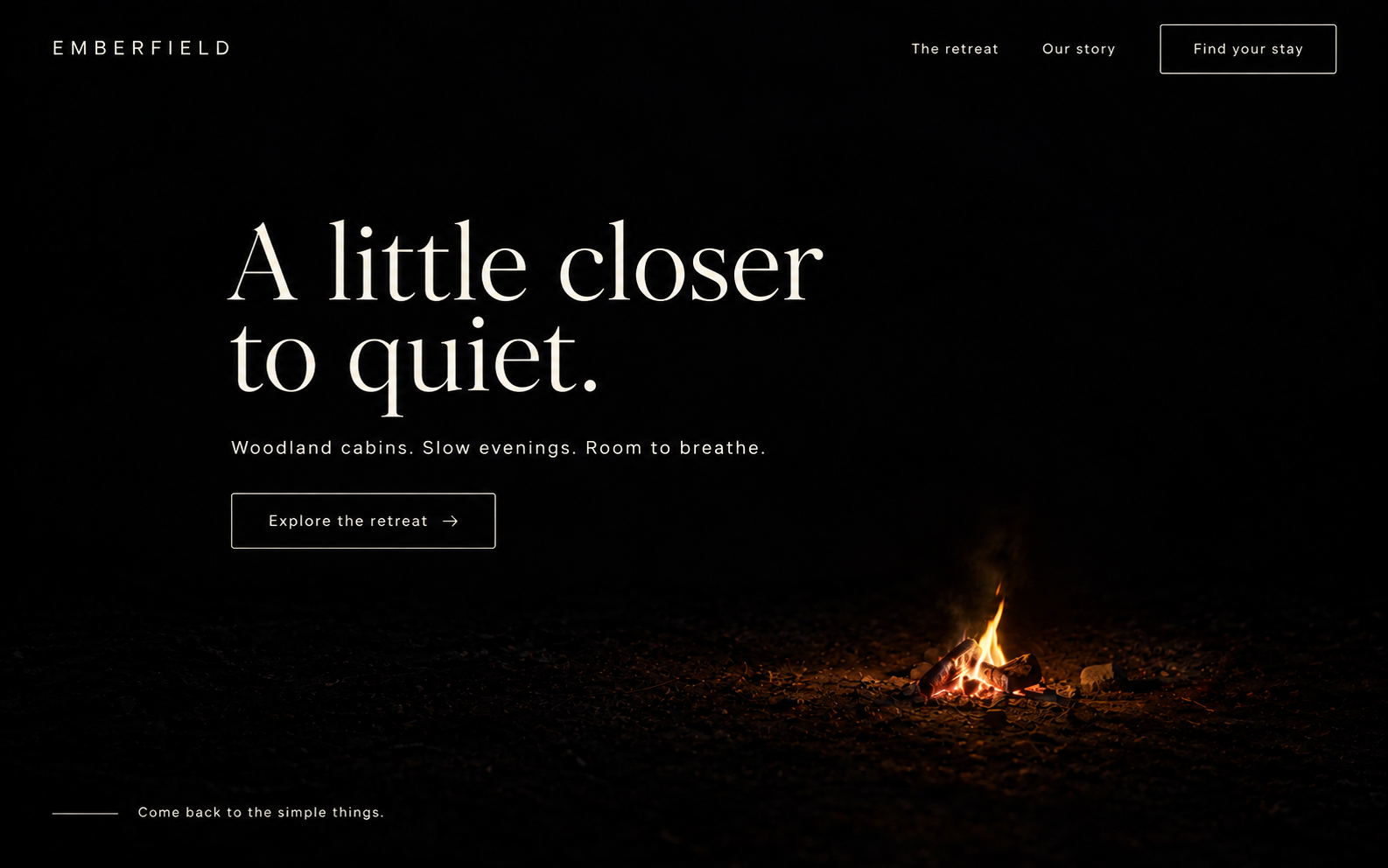 Emberfield woodland retreat website concept with ivory editorial typography and a small distant campfire against near-black night.