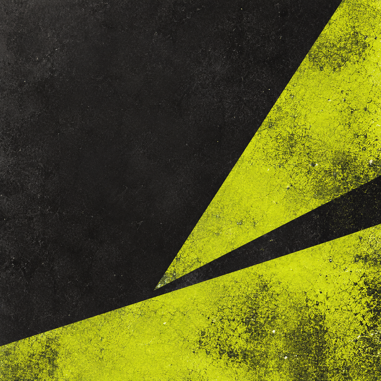 Coarse chartreuse grain in angular shapes on graphite.