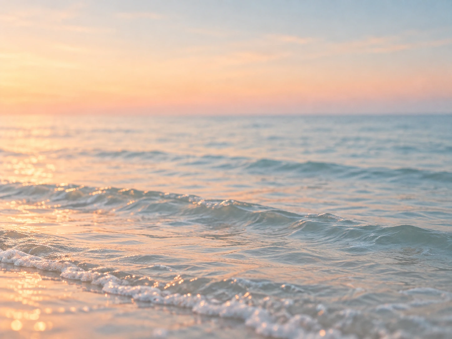 An open horizon in gentle peach-colored light. Detail image beside feature or story text.
