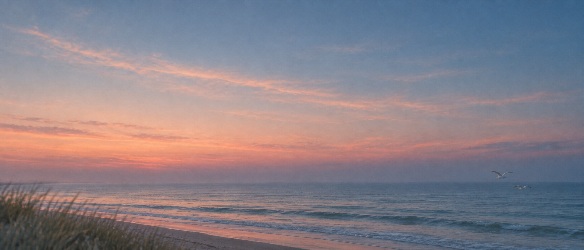 An open horizon in gentle peach-colored light. Dark section or closing banner.