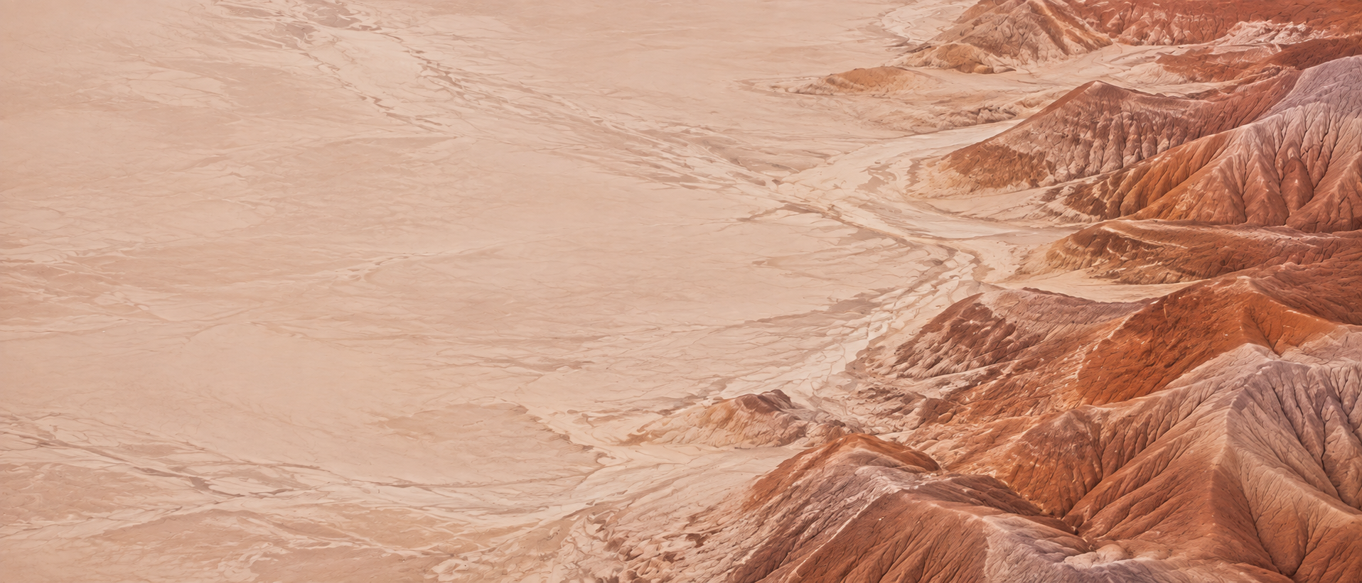 Sculpted desert lines and warm terracotta earth. Alternate hero with copy on left.